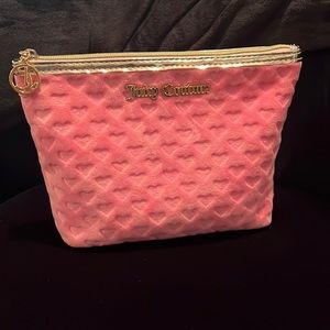 Used pink Juicy couture makeup bag